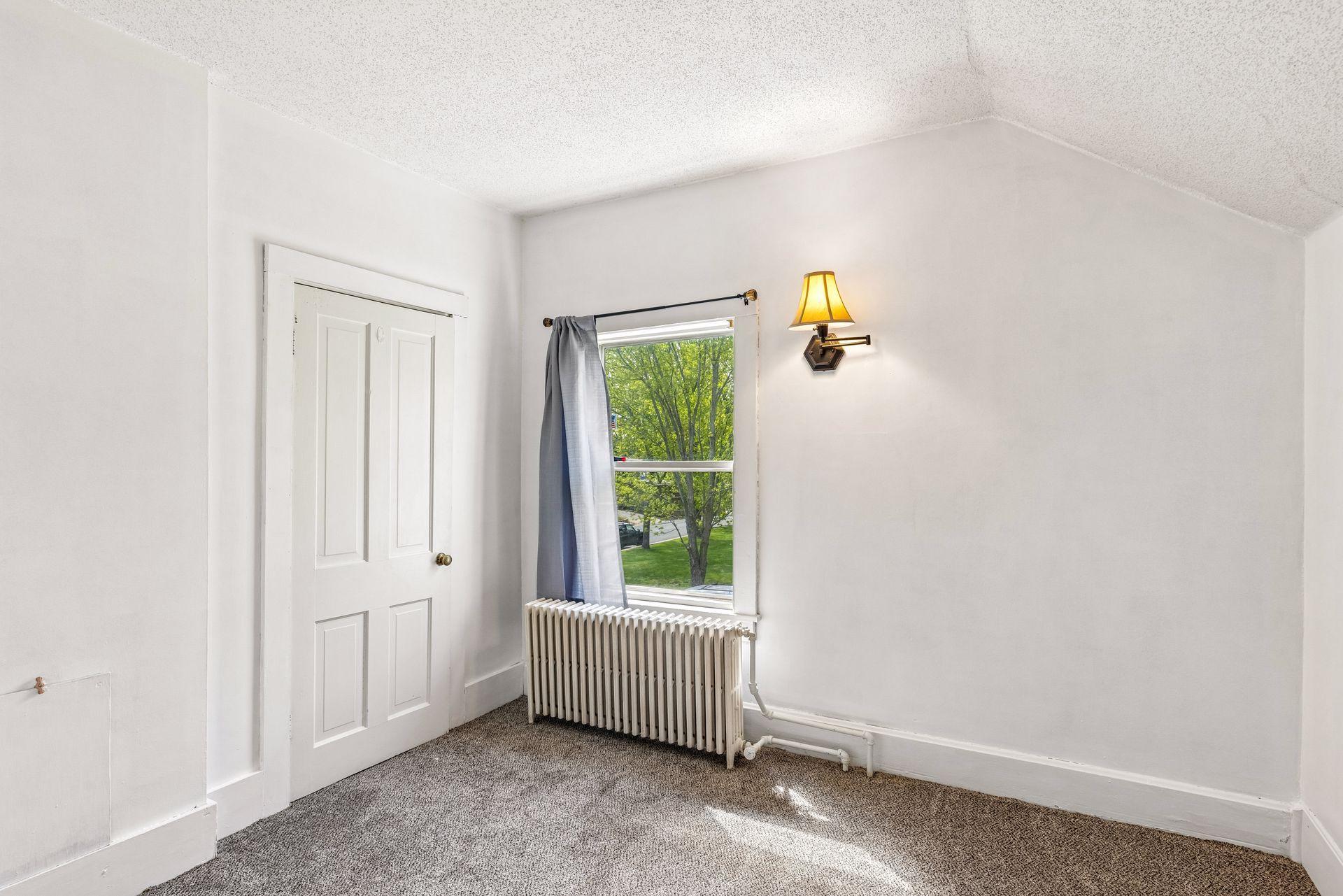 The second bedroom is located on the upper level