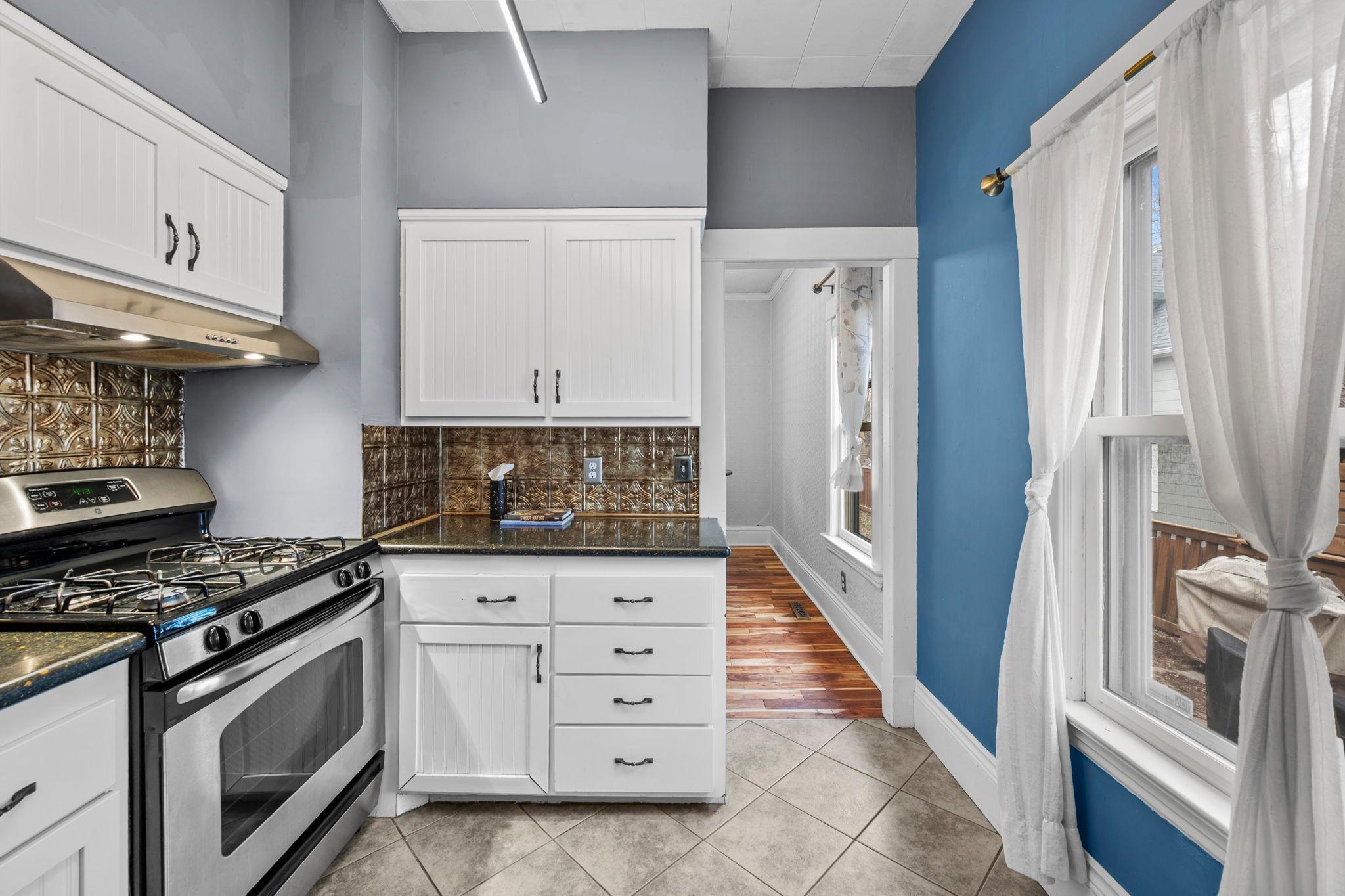 The space is thoughtfully designed for everyday use, with an open feel that provides room for a dine-in area, allowing for a relaxed and functional space.