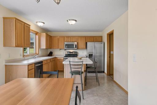 49 Windsor Wood Path - Spacious kitchen with island and stainless steel appliances