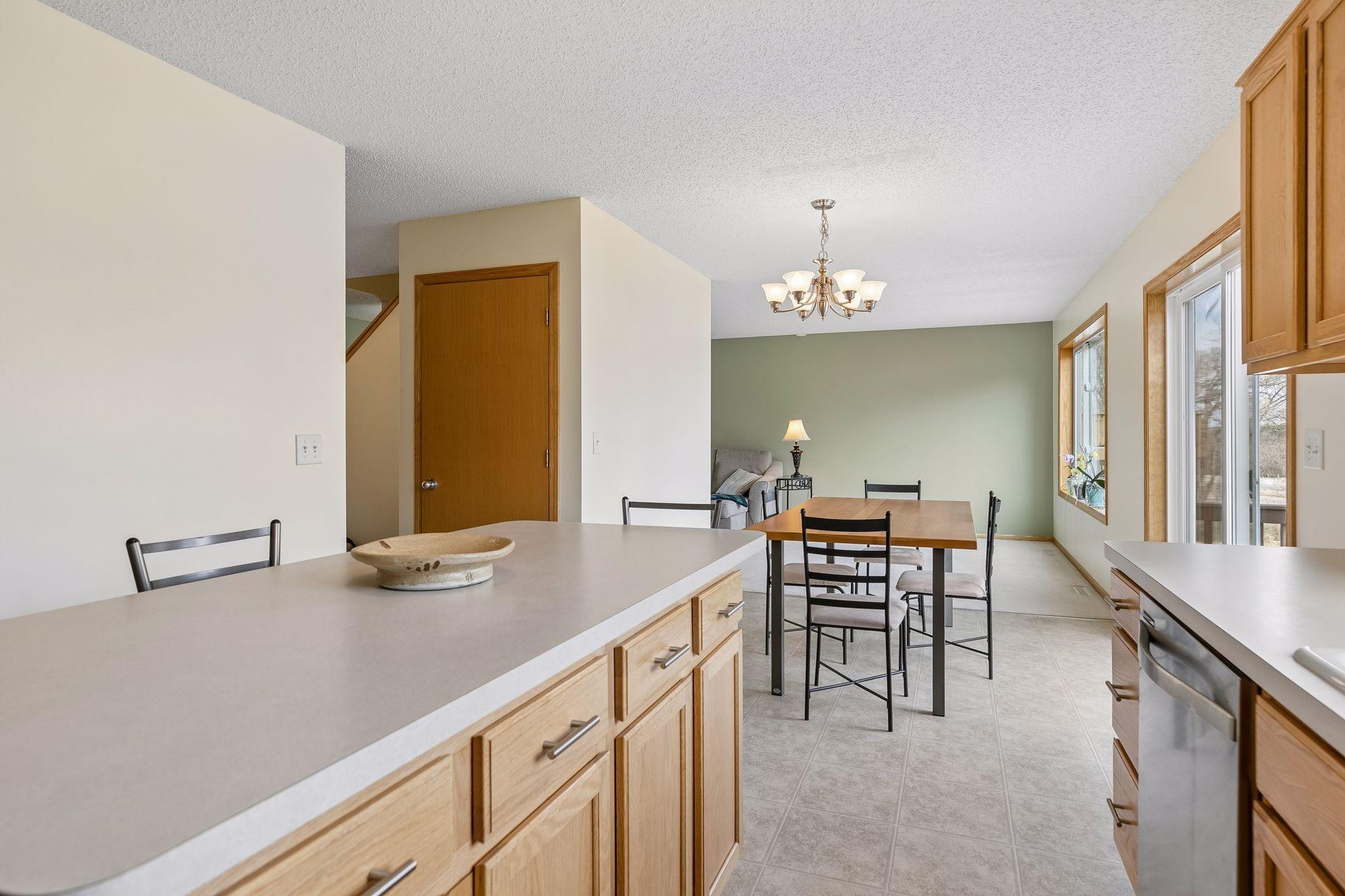 49 Windsor Wood Path - View from the kitchen into the dining area overlooking the nice backyard