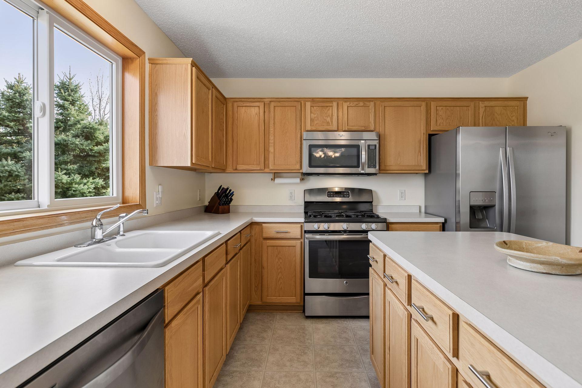 49 Windsor Wood Path - Well appointed kitchen with plenty of cabinetry and counter top space.