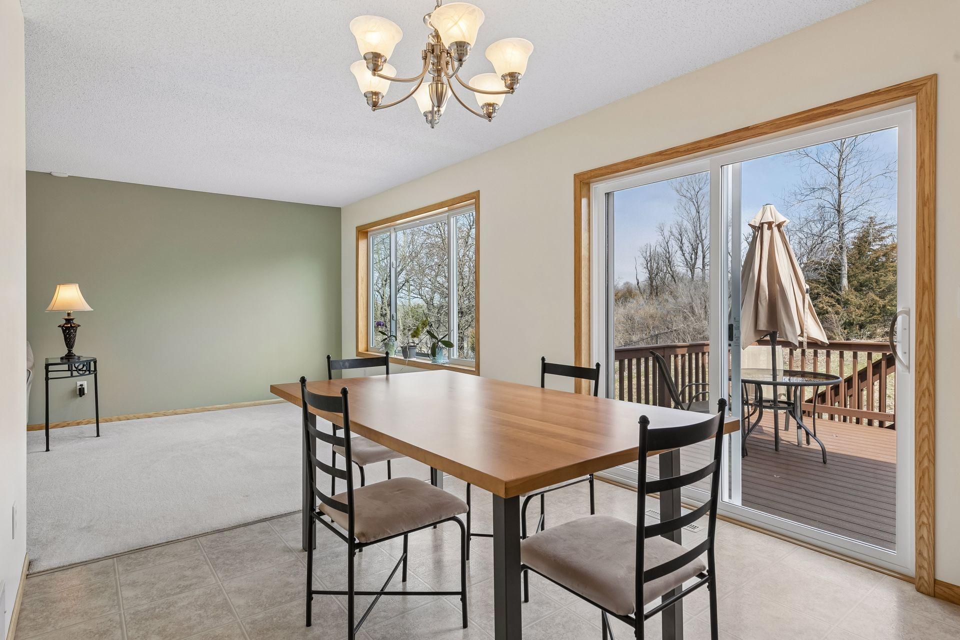 49 Windsor Wood Path - Dining area overlooking the deck and nice scenic backyard