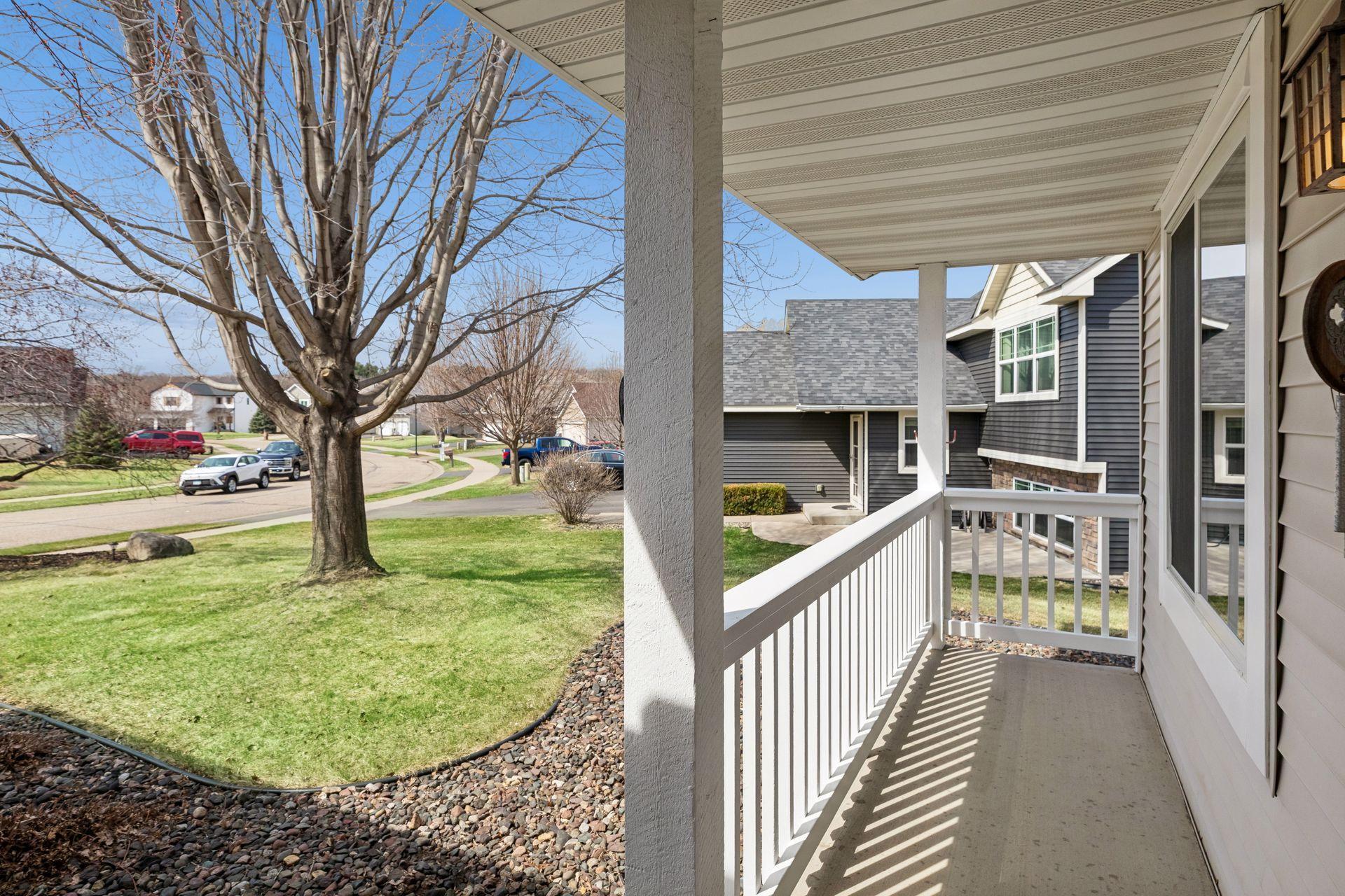 49 Windsor Wood Path - Nice covered front porch overlooking this charming neighborhood.