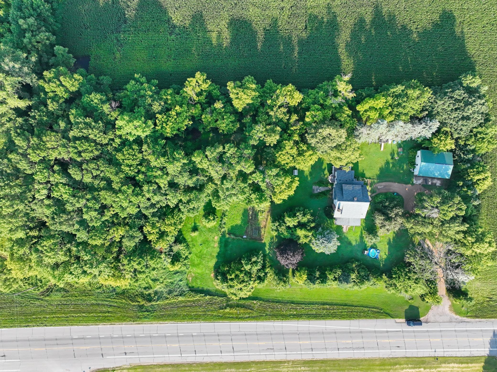 Aerial view with garden area towards the left of the house
