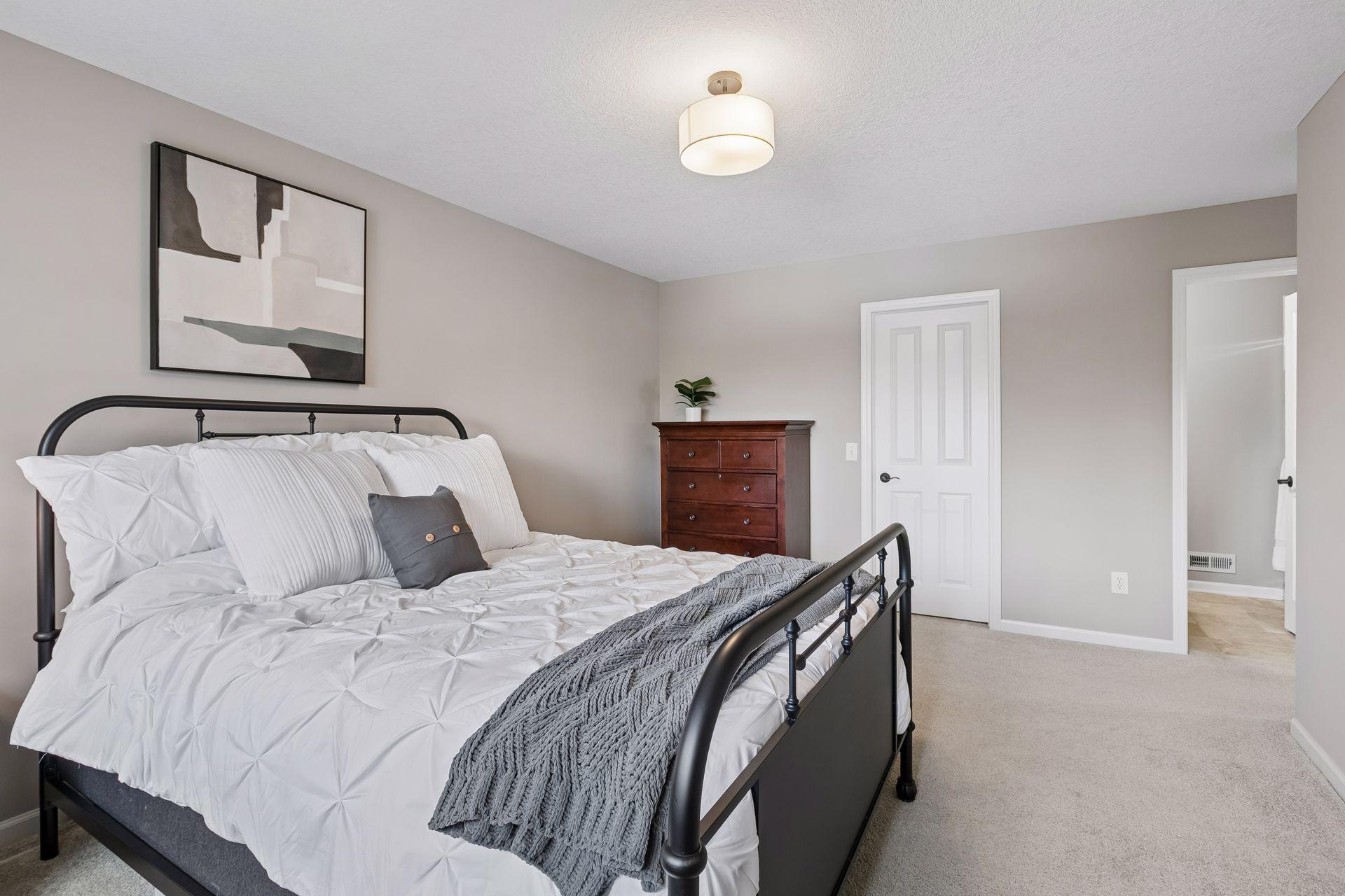 Fourth bedroom features a walk-in closet and 3/4 en suite bath