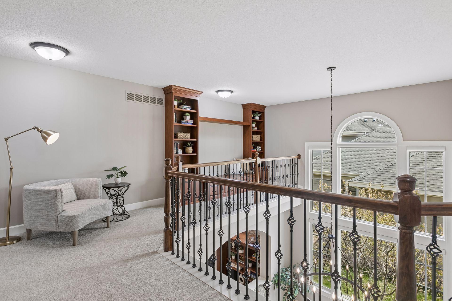 Upper level loft with built-in bookshelves/bench for a sunny reading nook