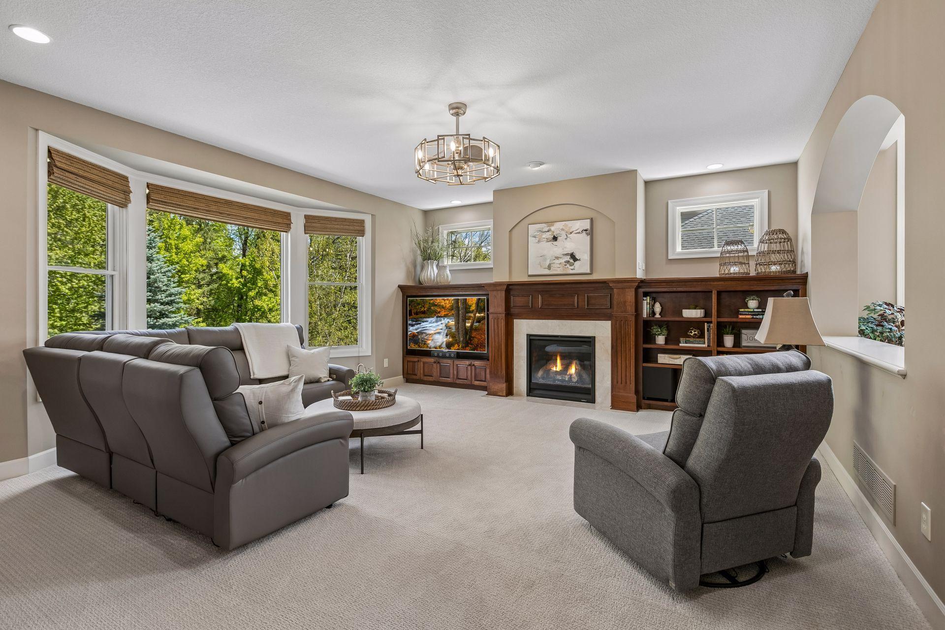 Main floor family room with custom built-ins and gas fireplace