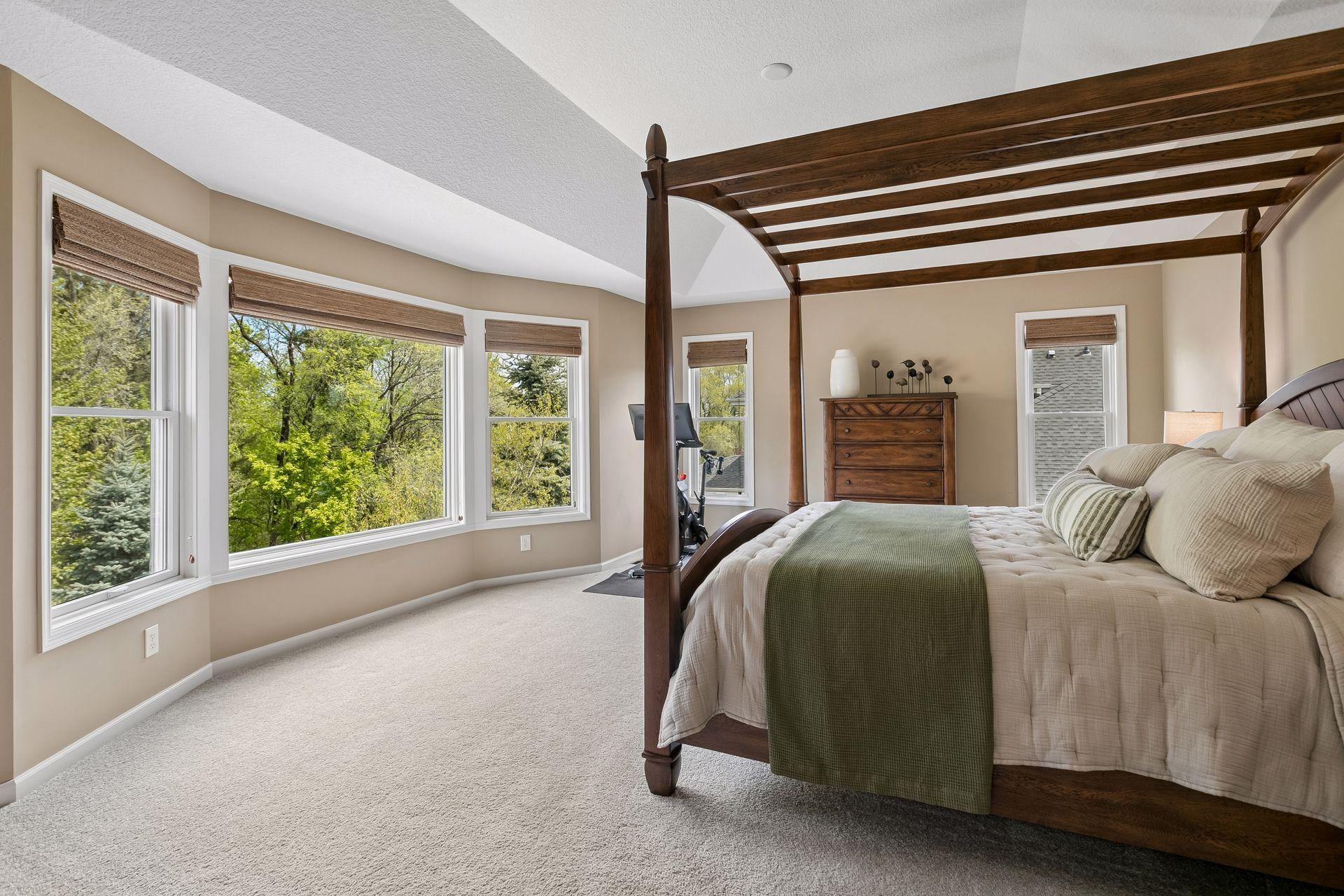 Large primary bedroom with bay window