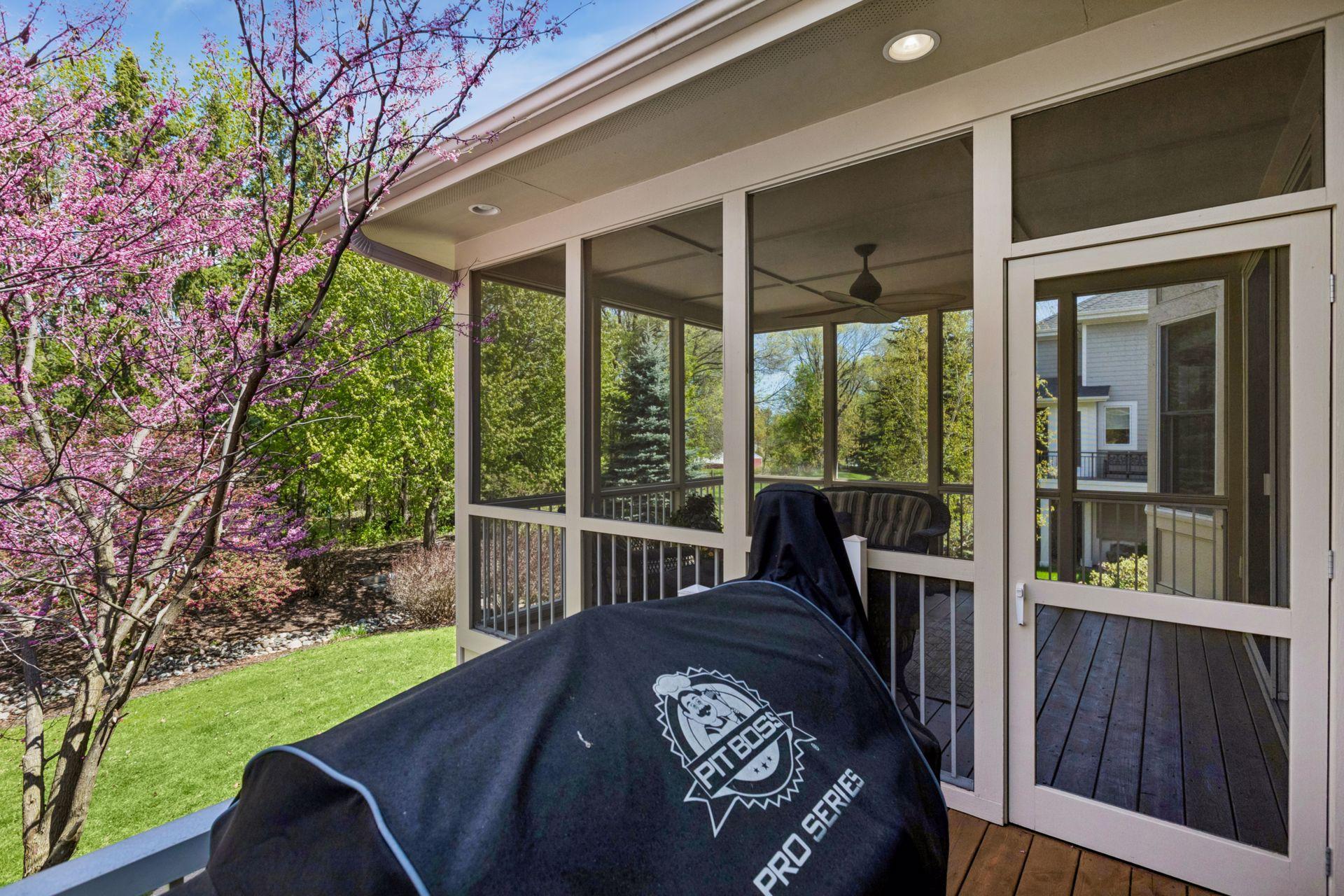 Grilling deck off of screen porch off of kitchen