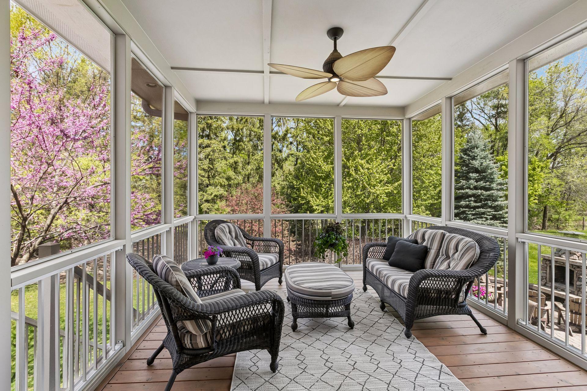 Enjoy the extensively landscape backyard from your screen porch