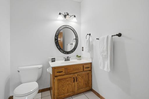 Main-level half bath with convenient location for guests