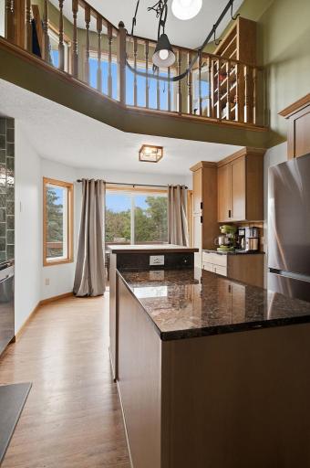 Informal dining area with backyard views and access to outdoor living