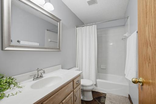 Upper-level full bathroom with tub/shower combination