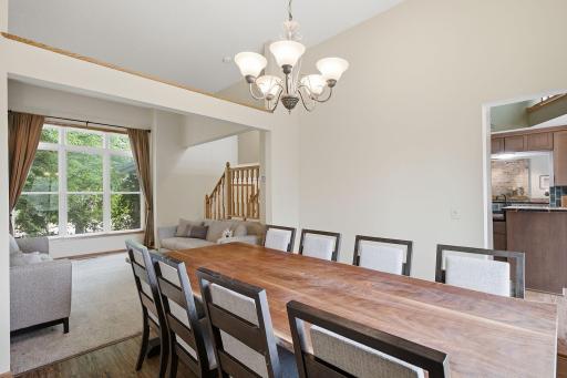 Dining room view showing connection to the stairway and nearby living areas