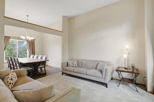 Bright living room with neutral finishes and comfortable gathering space