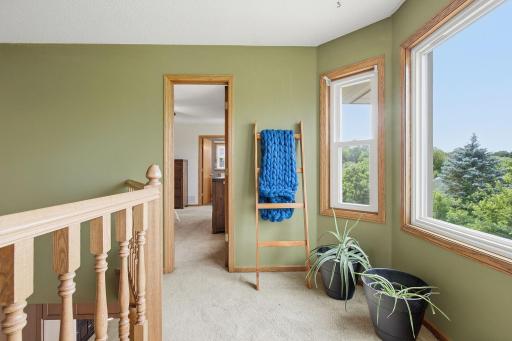 Reading loft adds flexible bonus space adjacent to primary bedroom