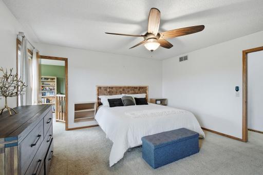 Primary bedroom with convenient access to private sitting room