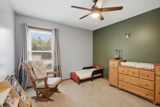 Upper-level bedroom #3 with fresh, comfortable feel and natural light