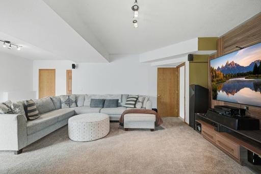 Expansive lower-level gathering area with multiple layout options