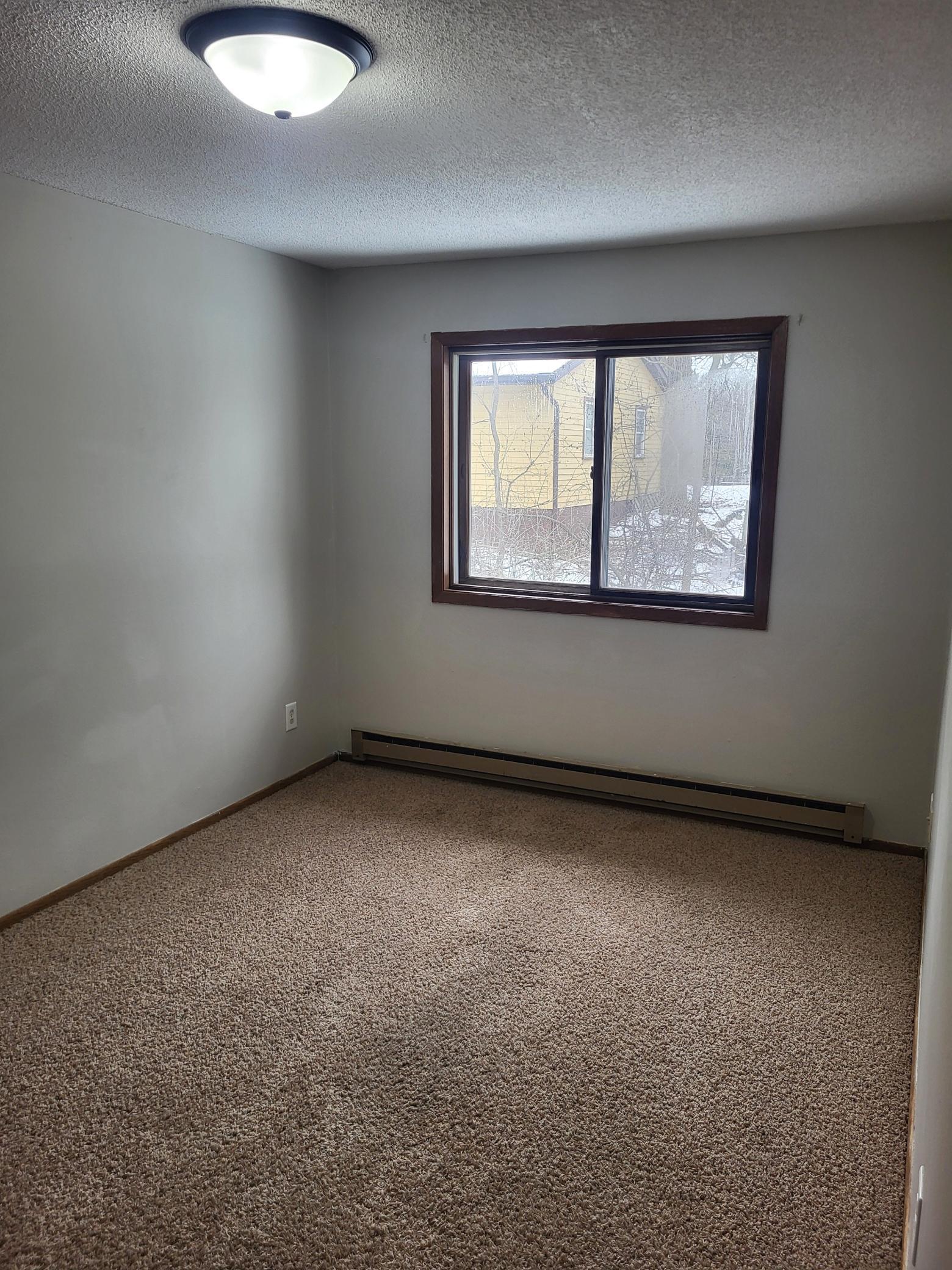 Miltona Apts #8 Bedroom 1.jpg