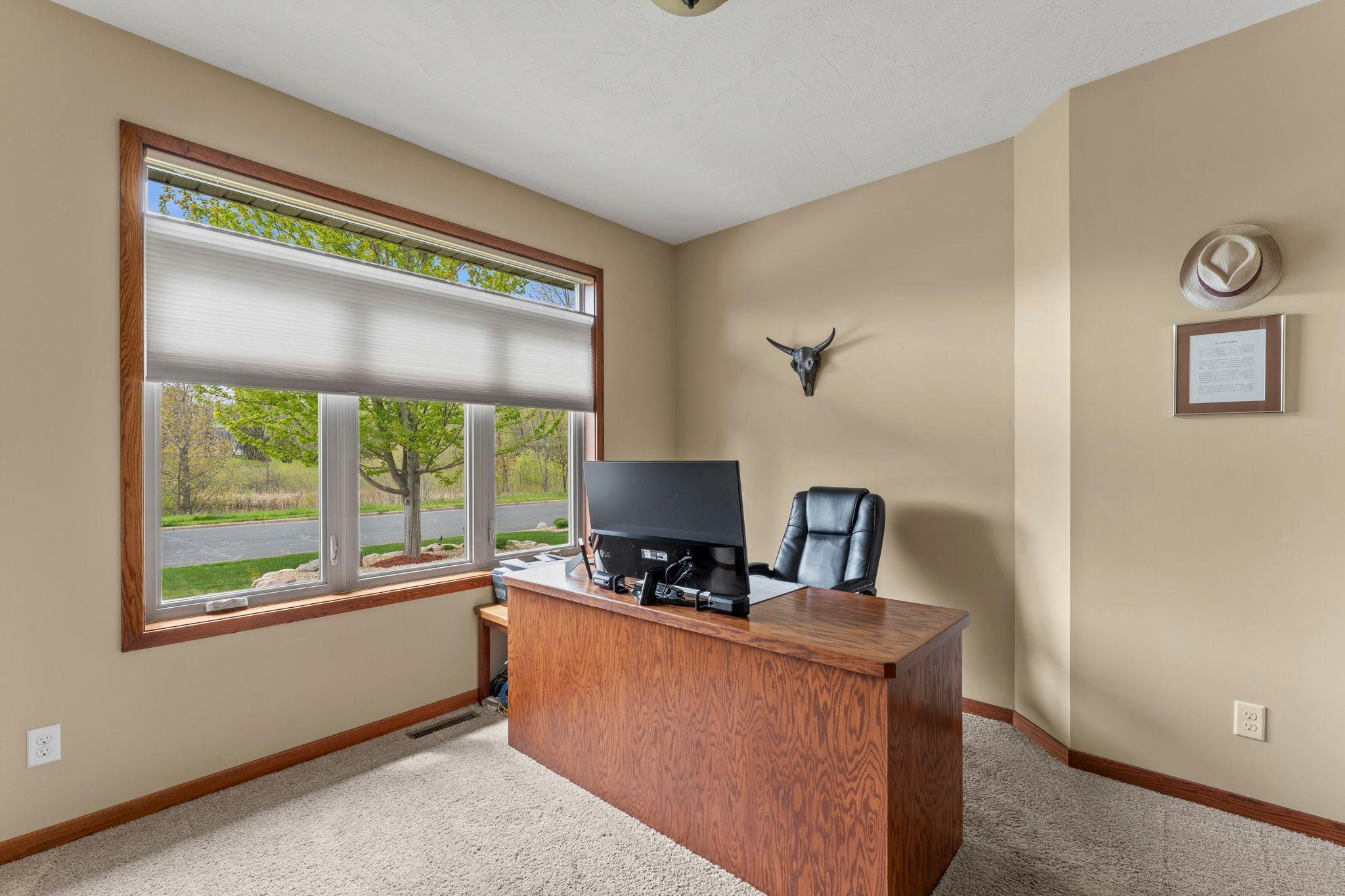 Main floor bedroom 2 flexes as a great home office