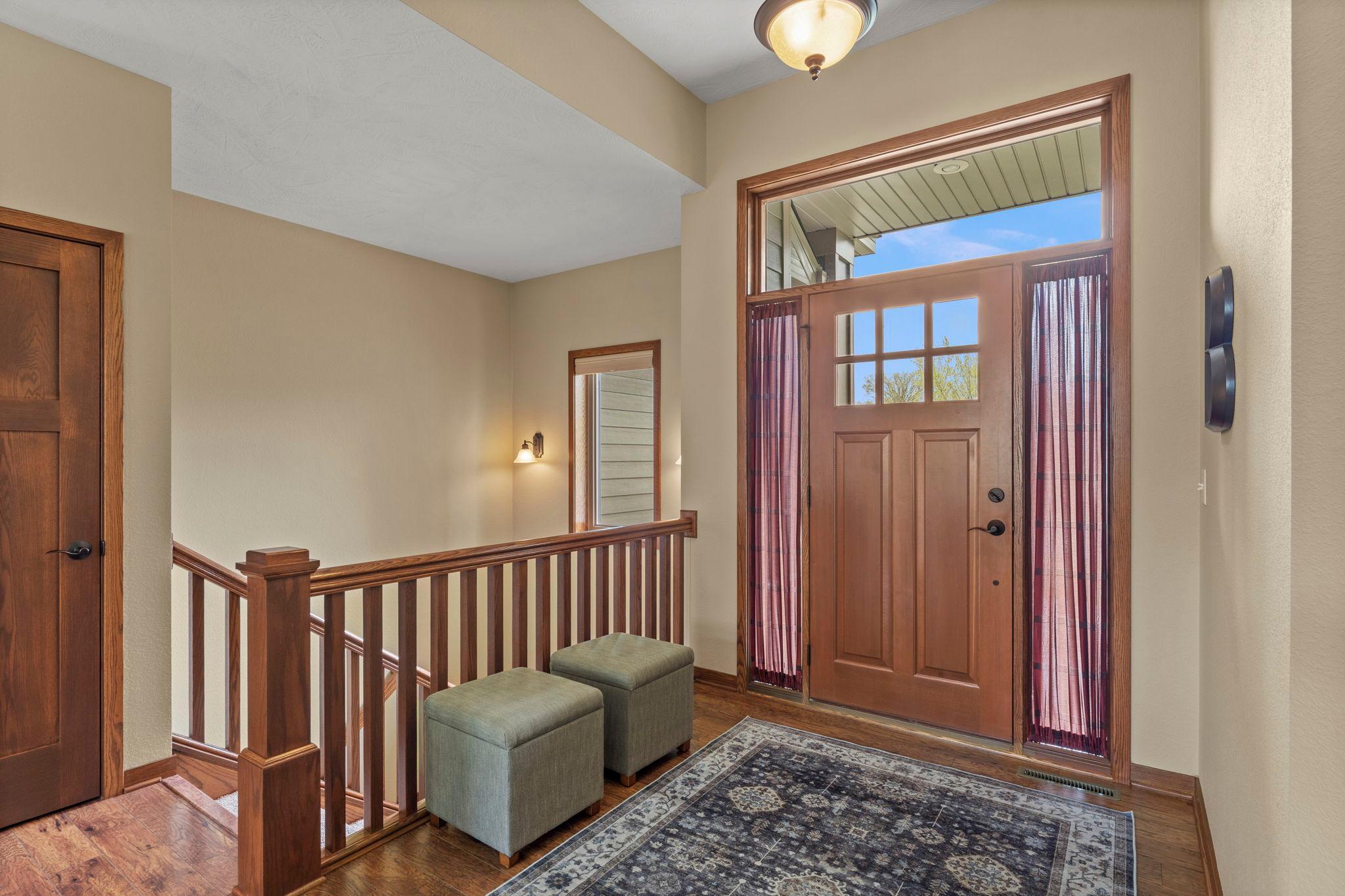 Open foyer showcases the rich wood detail