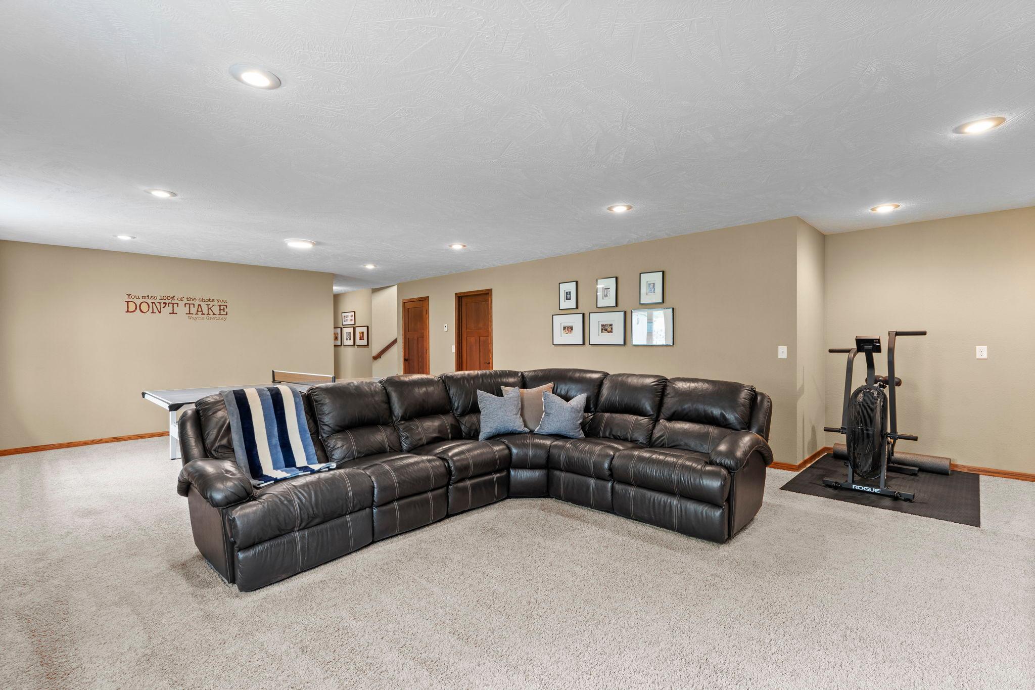 Family room offers plenty of space for multiple uses—perfect for relaxing, entertaining, or play