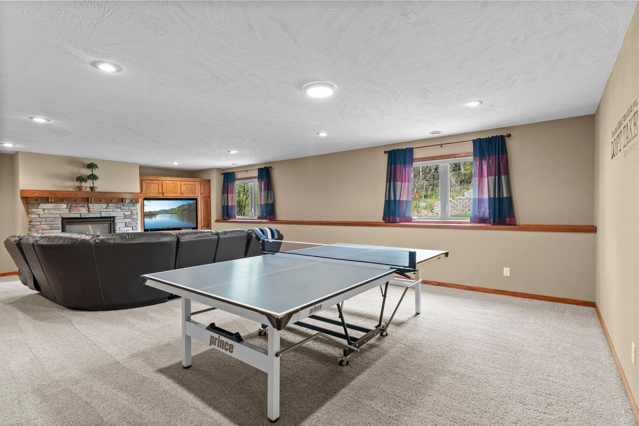 Generous lower-level family room—ideal for cozy movie nights or fun game nights