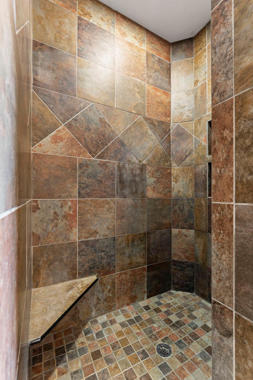 Tile walk-in shower with bench