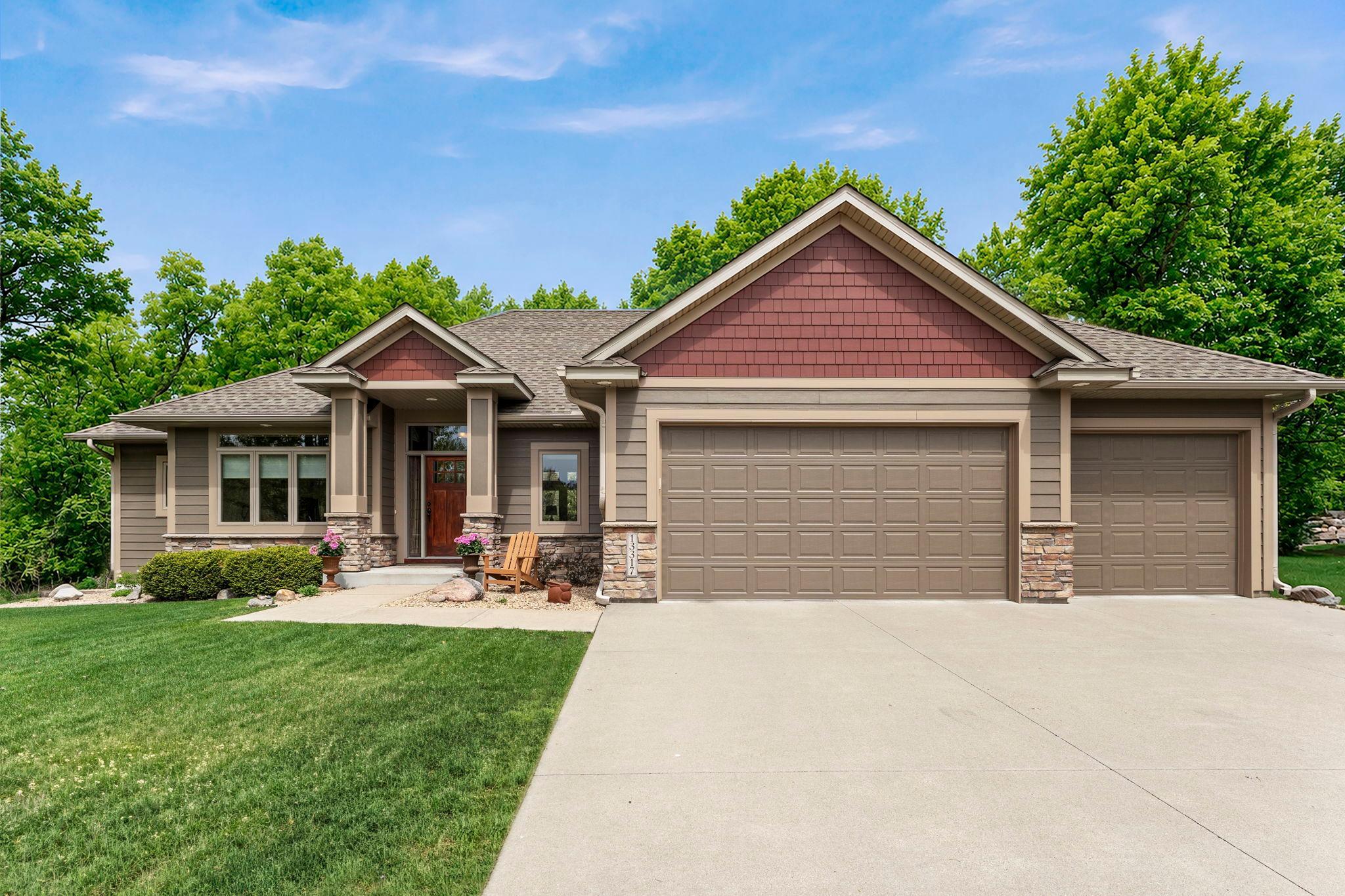 Concrete driveway and 3-car garage