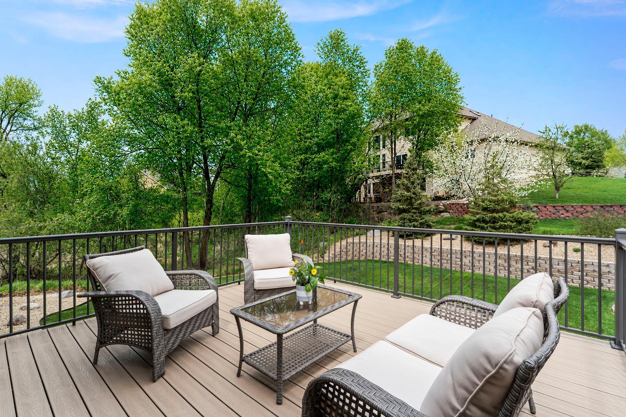 Step out from the dining room to the maintenance-free deck—perfect for easy grilling and relaxing
