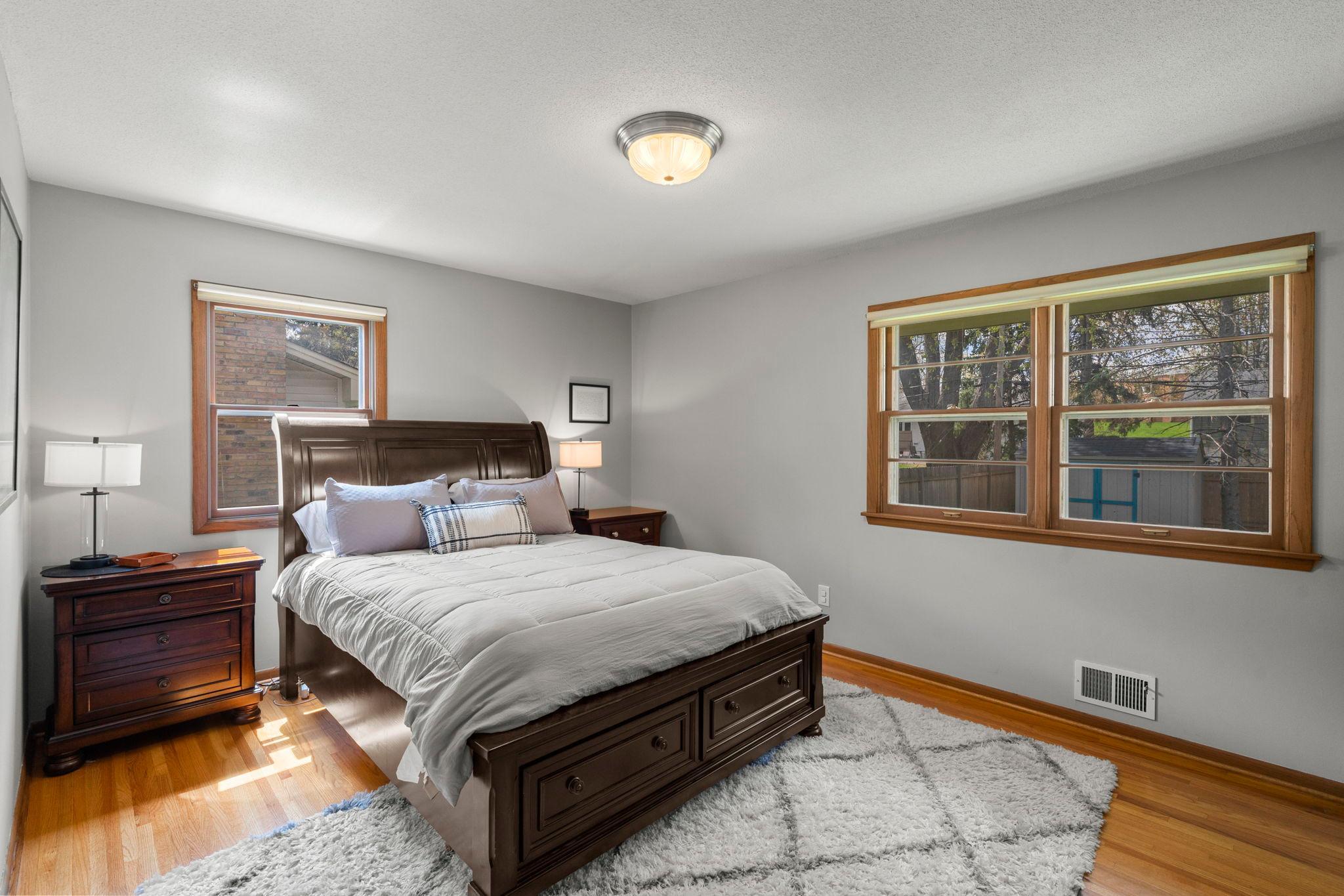 Perfect size primary bedroom with plenty of natural lighting!
