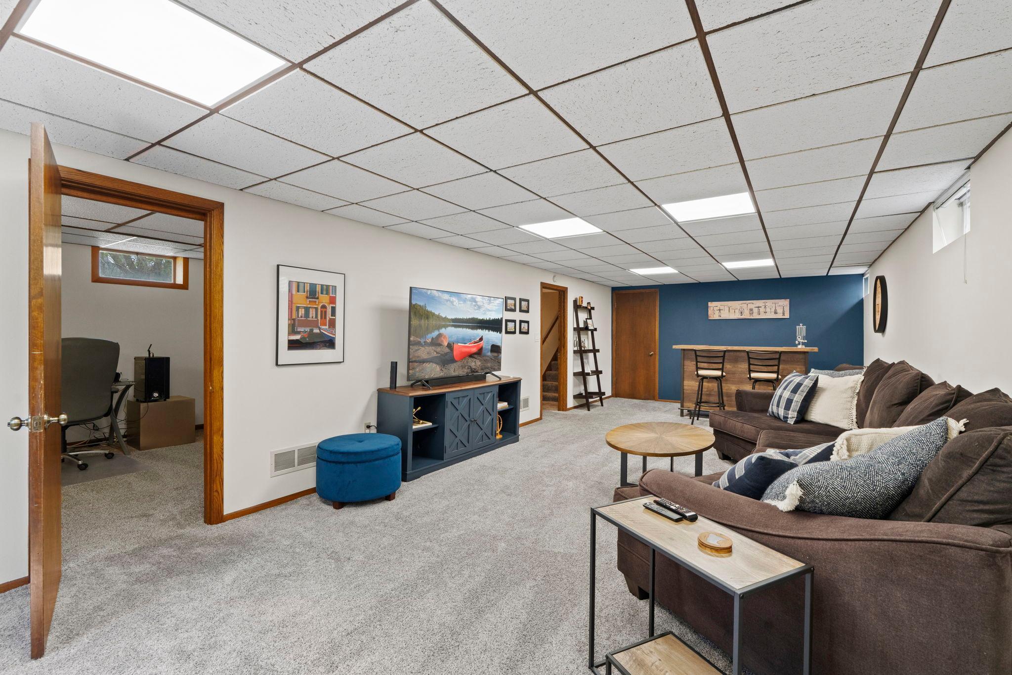 Office area off the famiy room- or make it an exercise room- or put in an egress window to make this another bedroom!