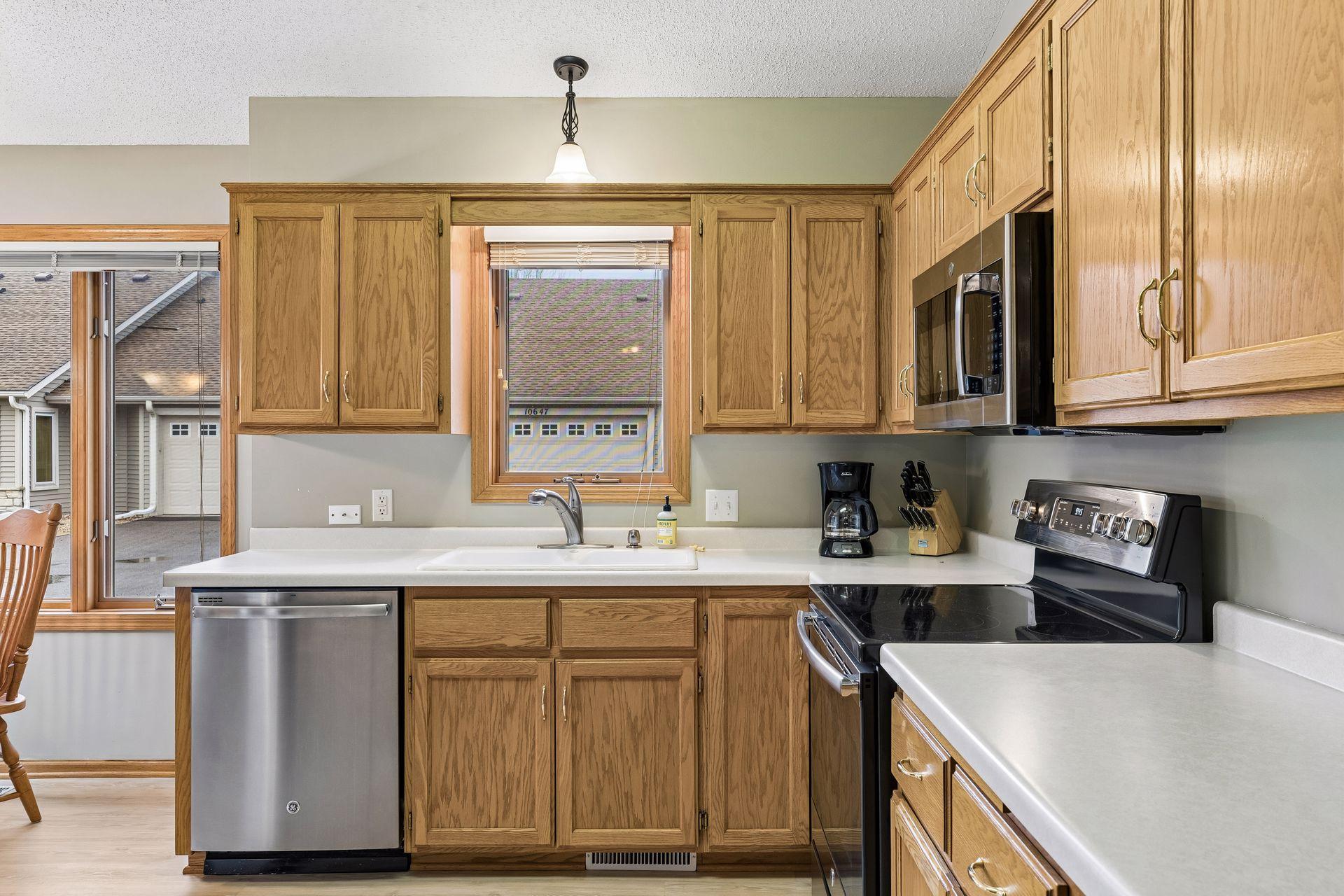 Window above sink and lots of cabinets
