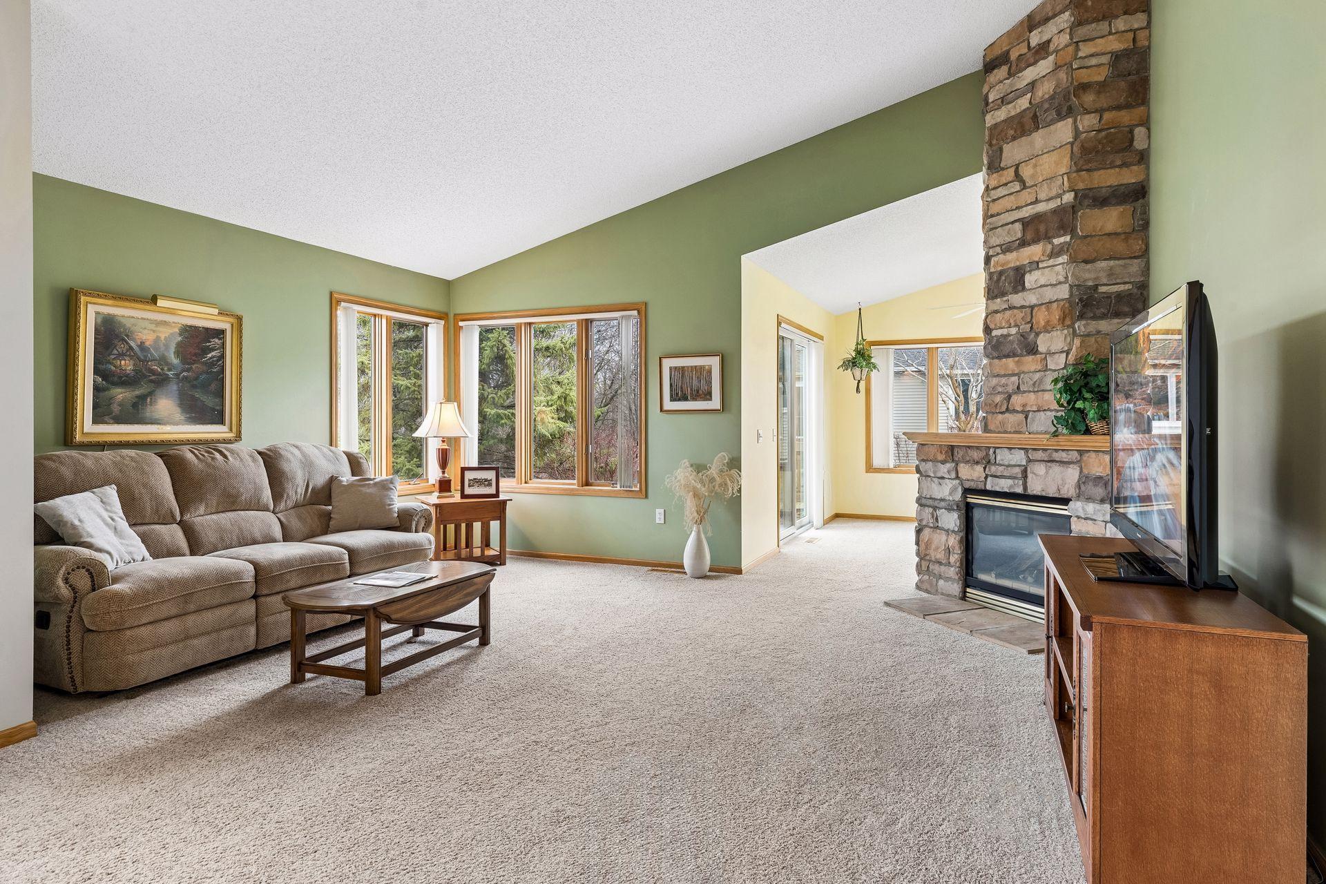 Beautiful 2 story stone gas fireplace