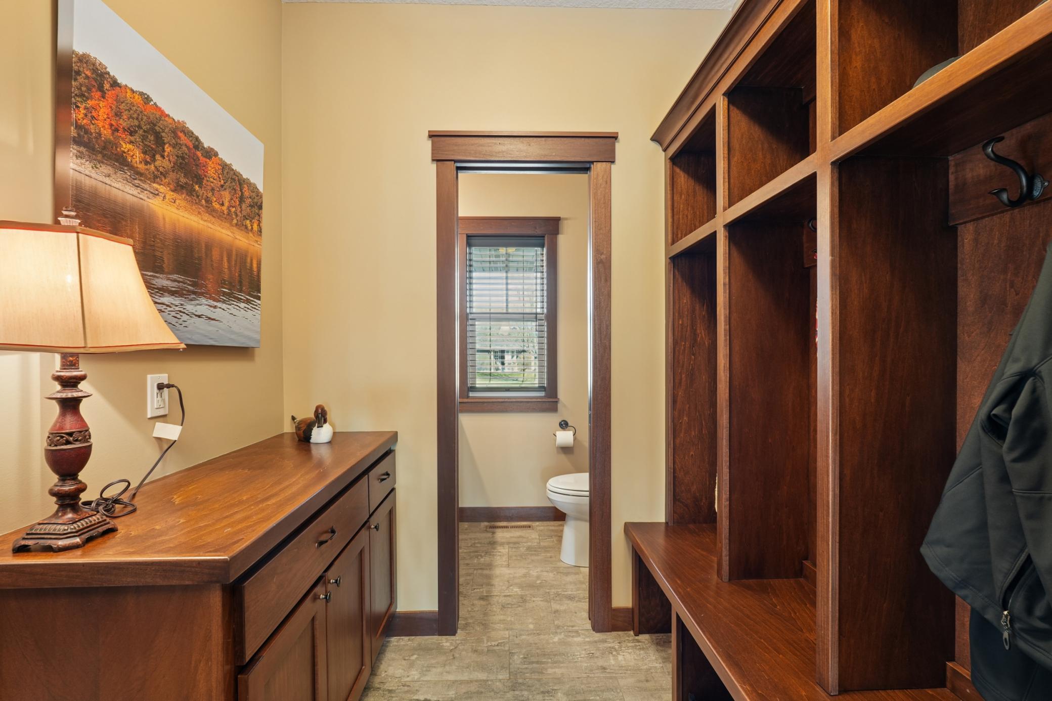 Arrive home to a well-planned mudroom that keeps the living spaces neat and clutter-free. A practical luxury that many will use and love every single day