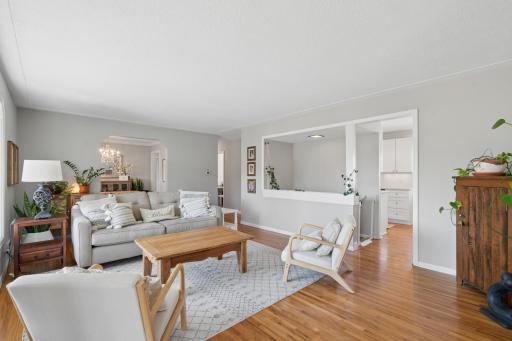 Light and bright living room with gleaming hardwoods.