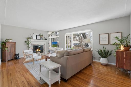 The fireplace makes this living space feel cozy & comfortable.