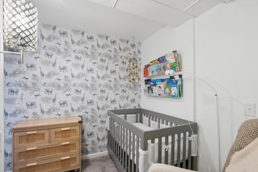 This darling room is used as a nursery now, but can be converted to a walk in closet too!