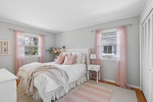 This bedroom has amazing window light and plenty of great closet space.