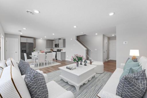Enjoy the natural light in your truly open living space. (Model photo, colors may vary)