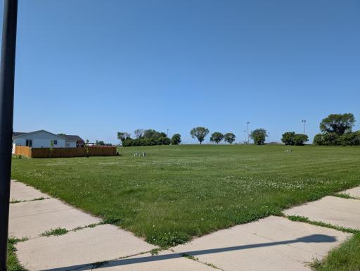 Corner lot on a cul de sac offers great views.