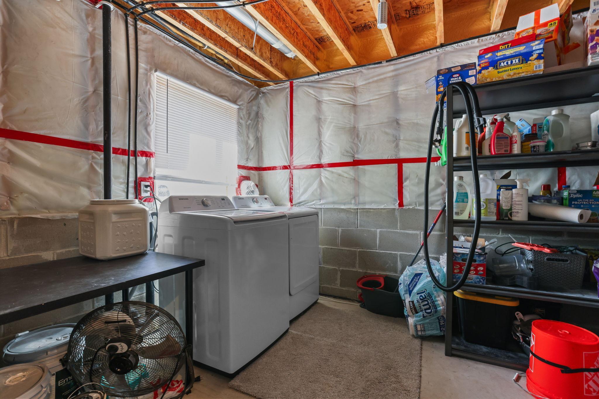 Lower Level Laundry Room. Washer/Dryer included in sale.