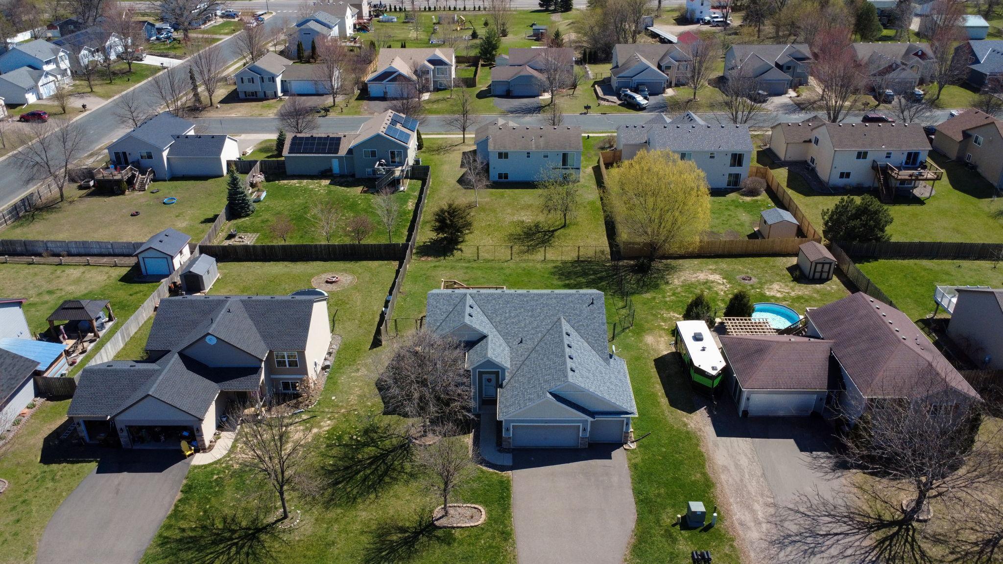 Fully Fenced in Back Yard with Black 6'3" High Chain Link Fence.