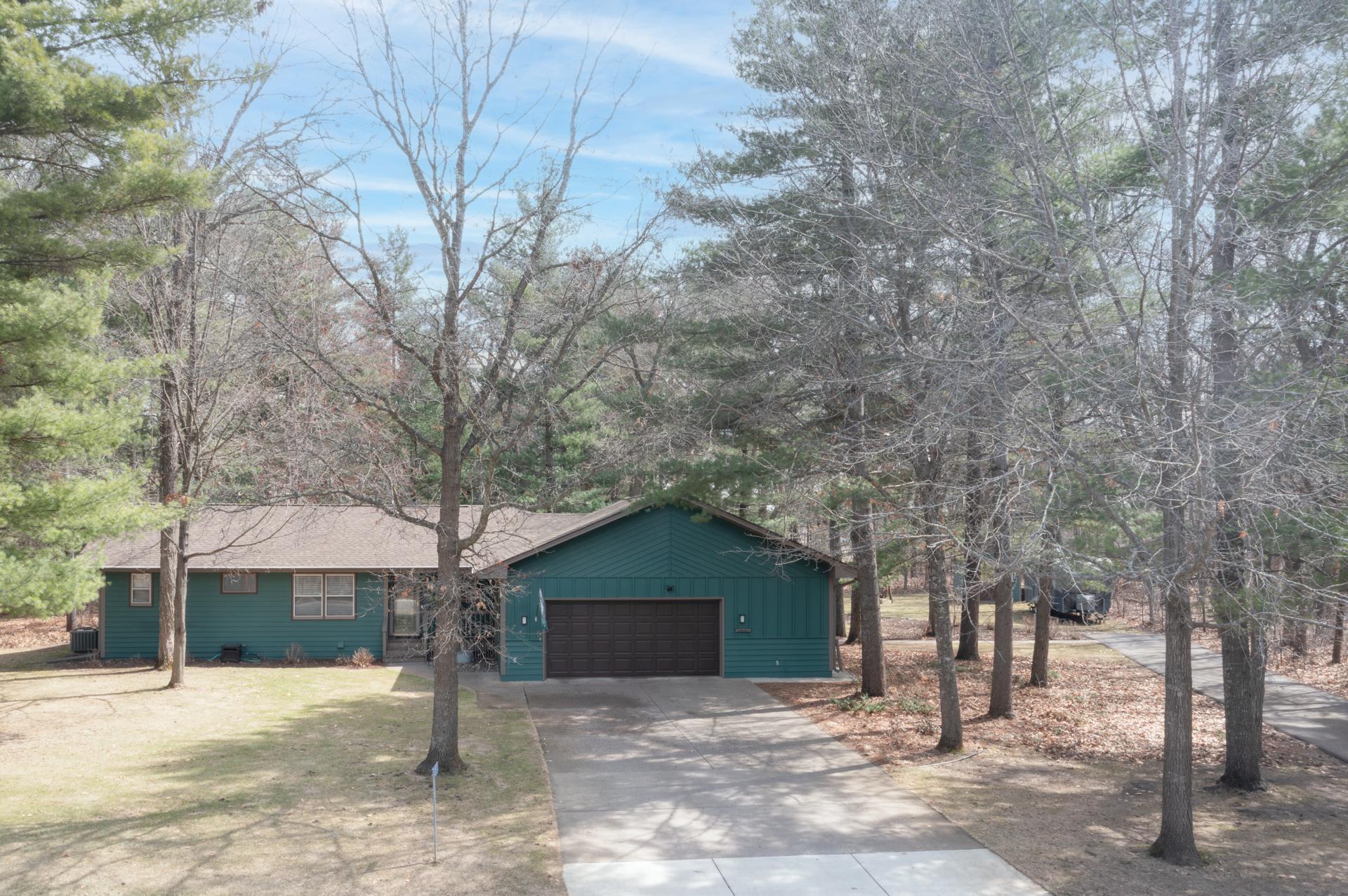 Charming curb appeal set on a serene, tree-lined lot.