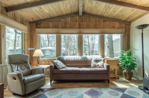 Bright room with large windows showcasing beautiful views.