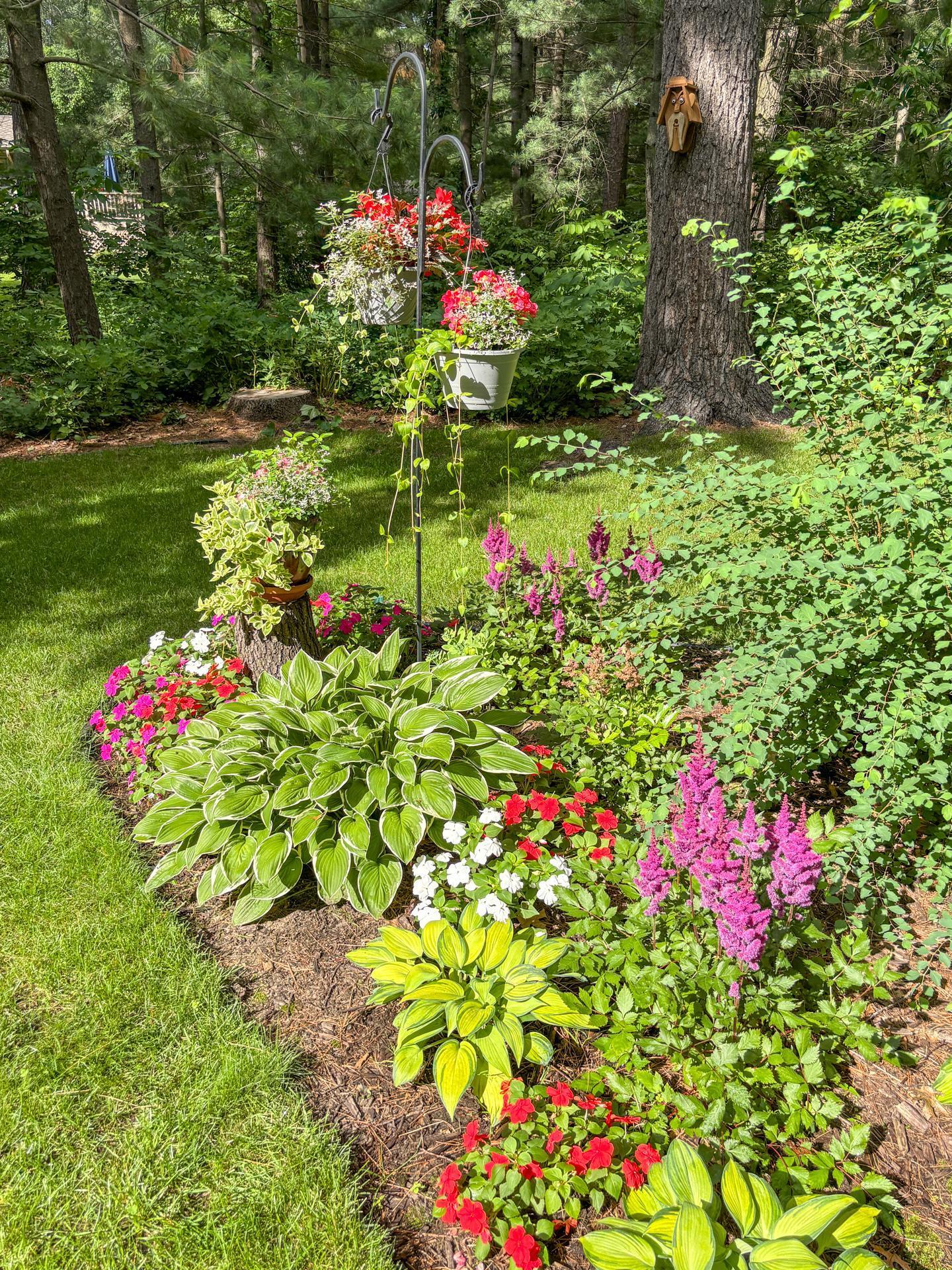 Beautifully maintained landscaping with vibrant seasonal blooms.