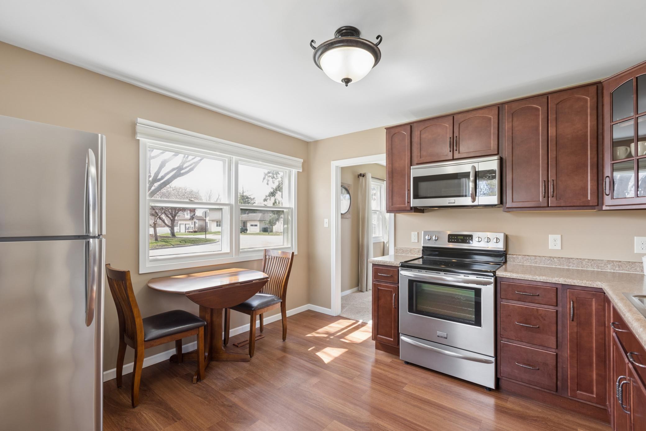 The kitchen features stainless steel Frigidaire Gallery appliances.
