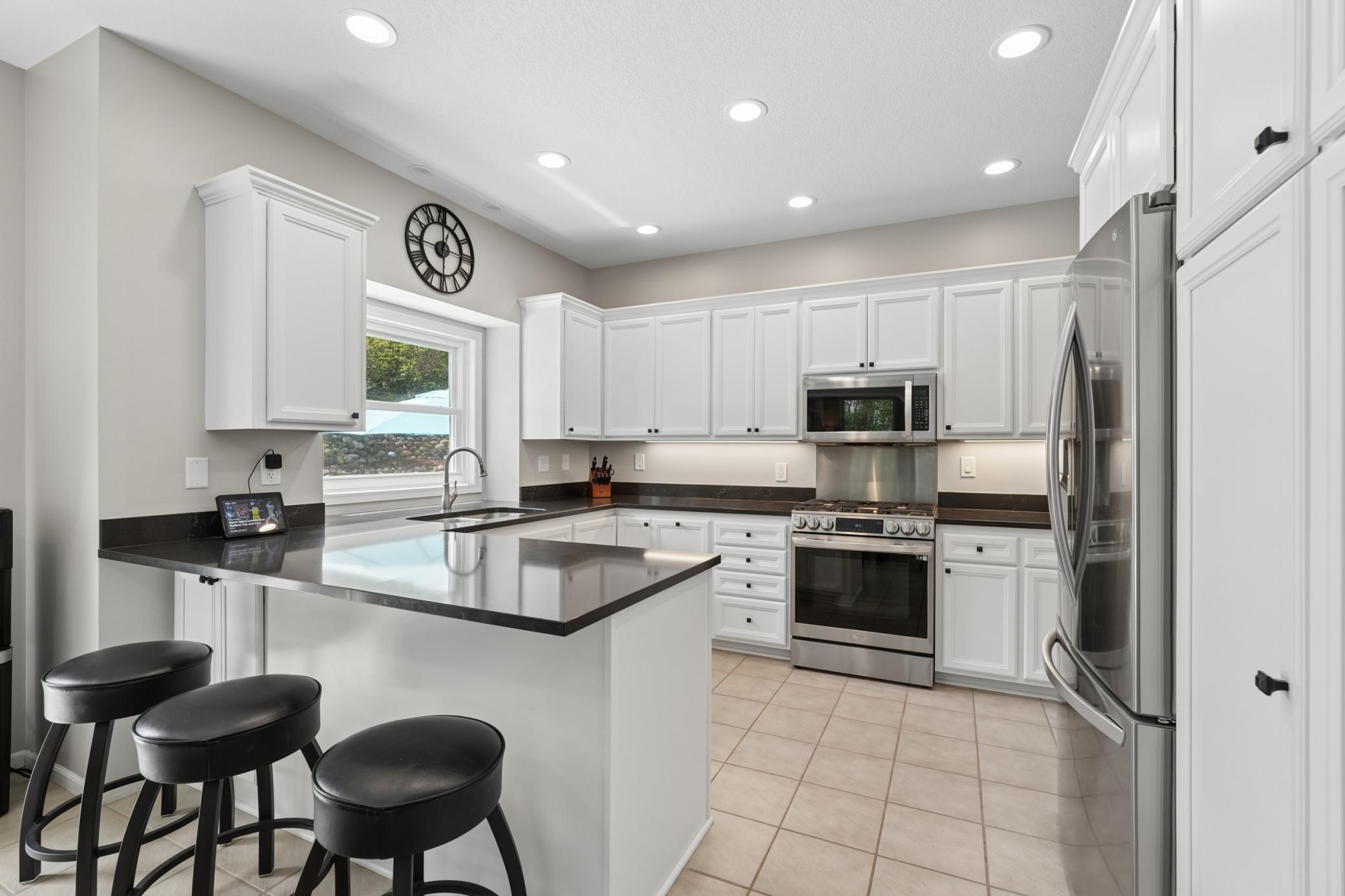 Stainless steel appliances & beautiful counter tops.