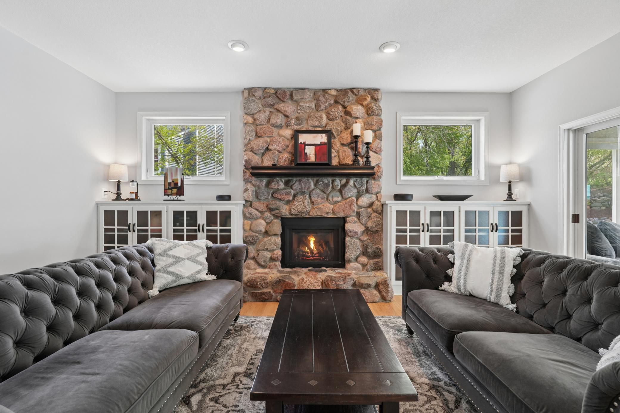 Impressive fireplace and hardwood floors!